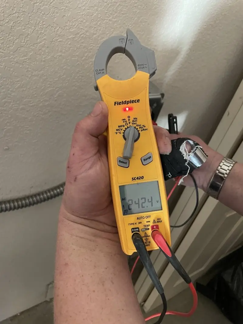Voltage testing with clamp meter during Generator Installation in Mattawan